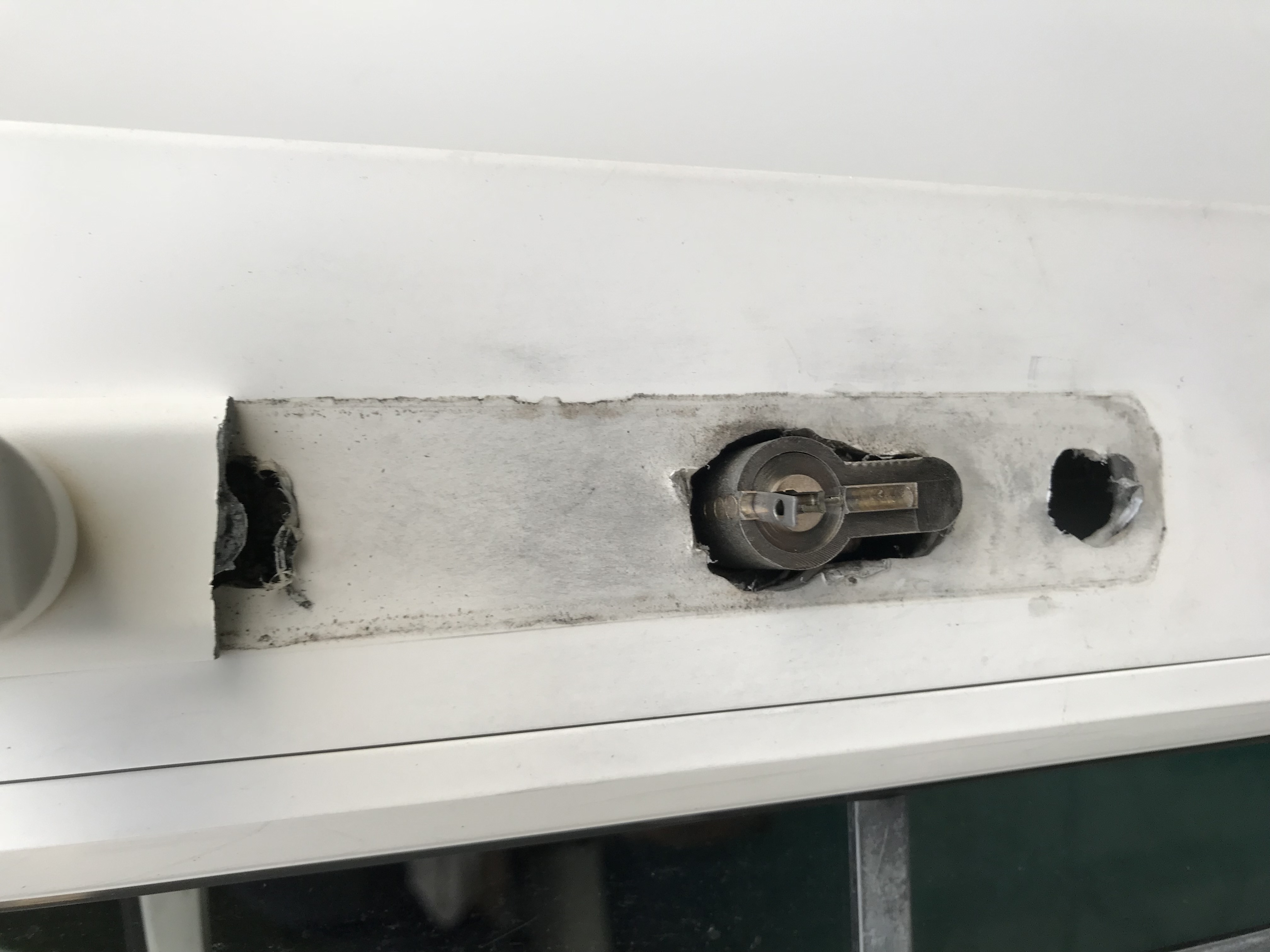 White upvc door with snapped lock and handle